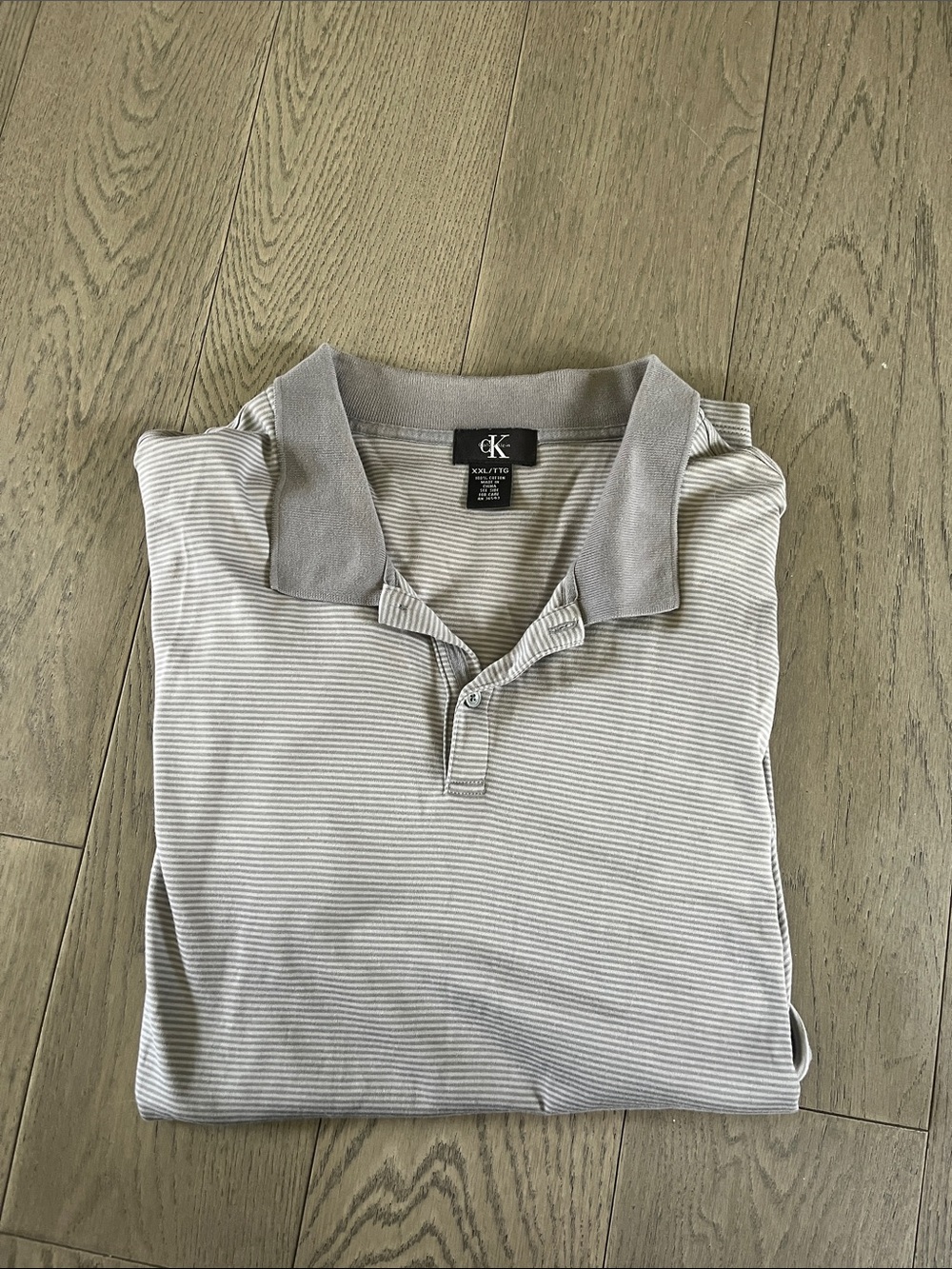 Calvin Klein Men’s Light Gray and White Striped Polo